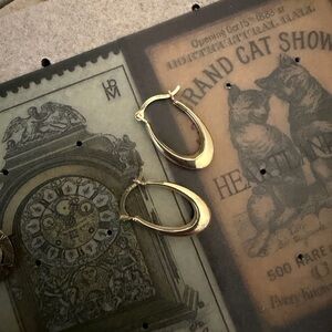 dainty 14kt solid yellow gold elongated oblong oval small hoop earrings over 1/2